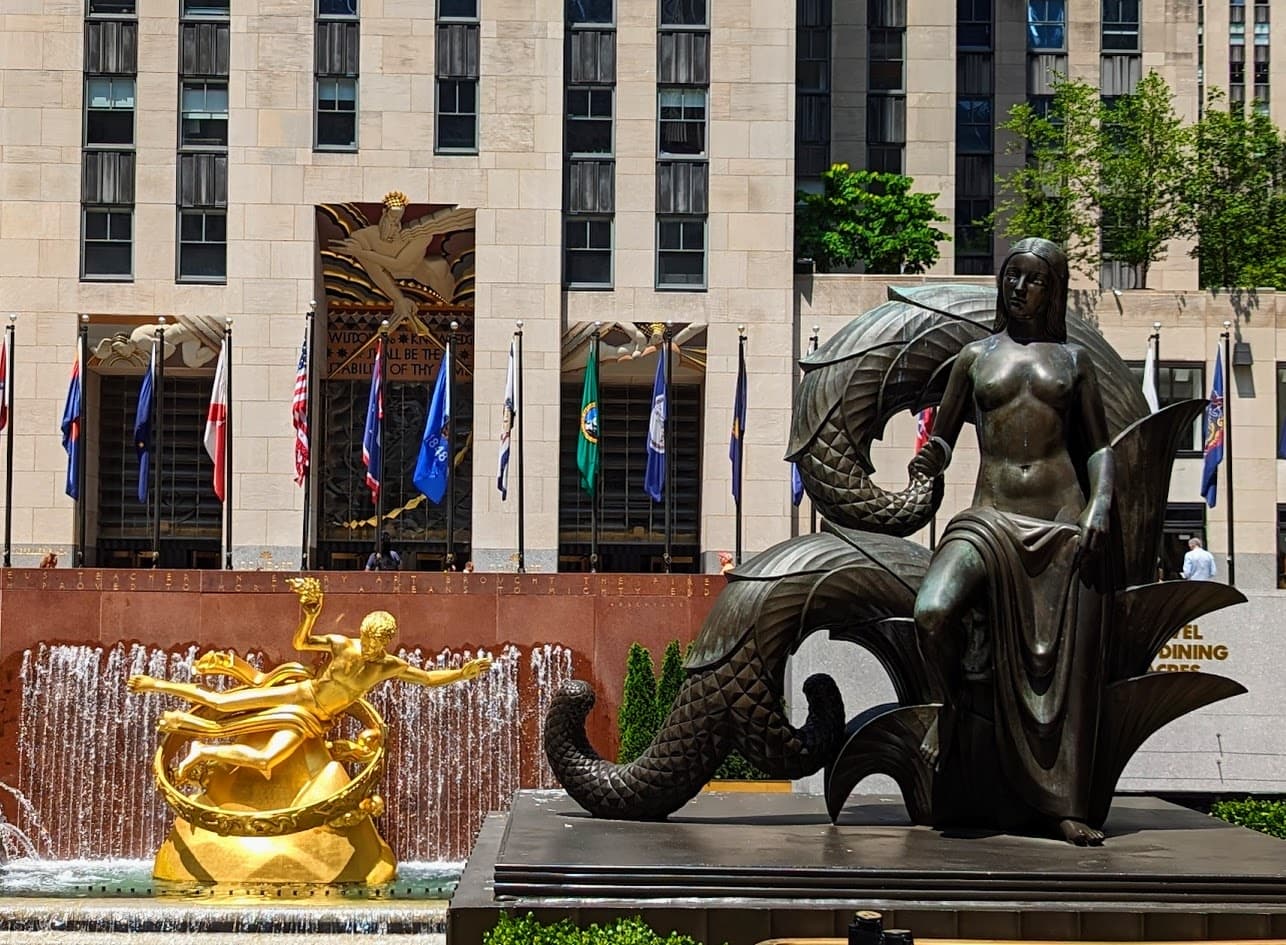 Sculptures and fountain at Rockefeller Center plaza in NYC
