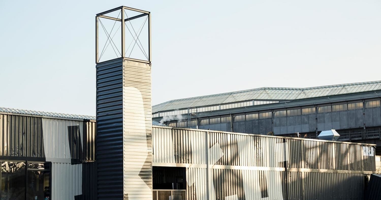 Industrial brewery exterior and tower at BRLO brewhouse, Berlin