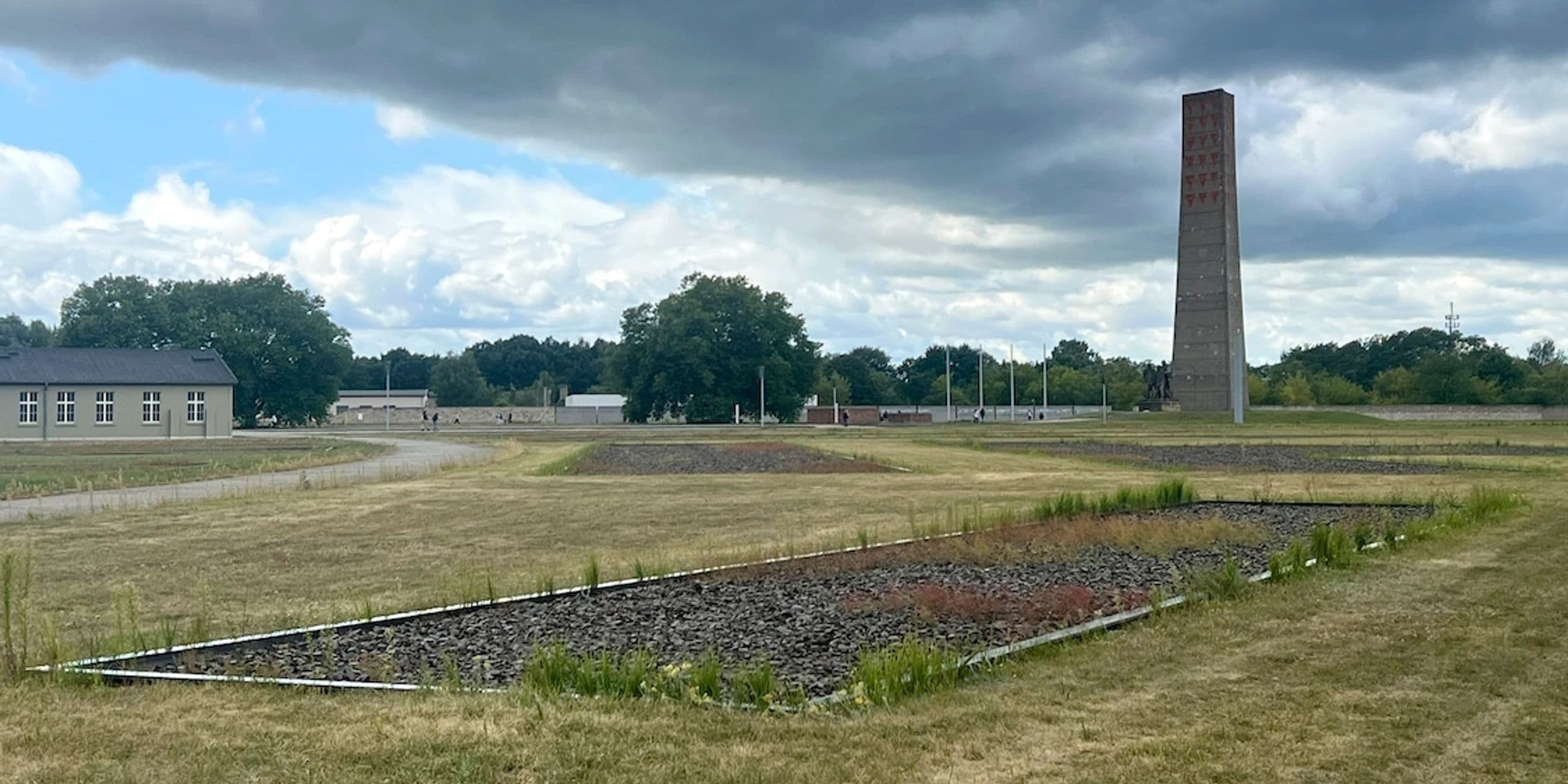 Historic memorial grounds with obelisk and open lawn in Berlin