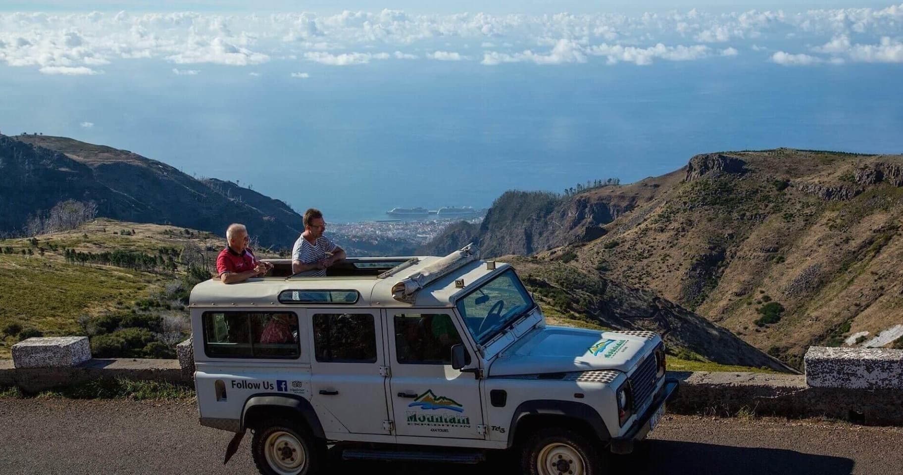 Coastal viewpoint with 4x4 jeep overlooking sea, Madeira offroad tour