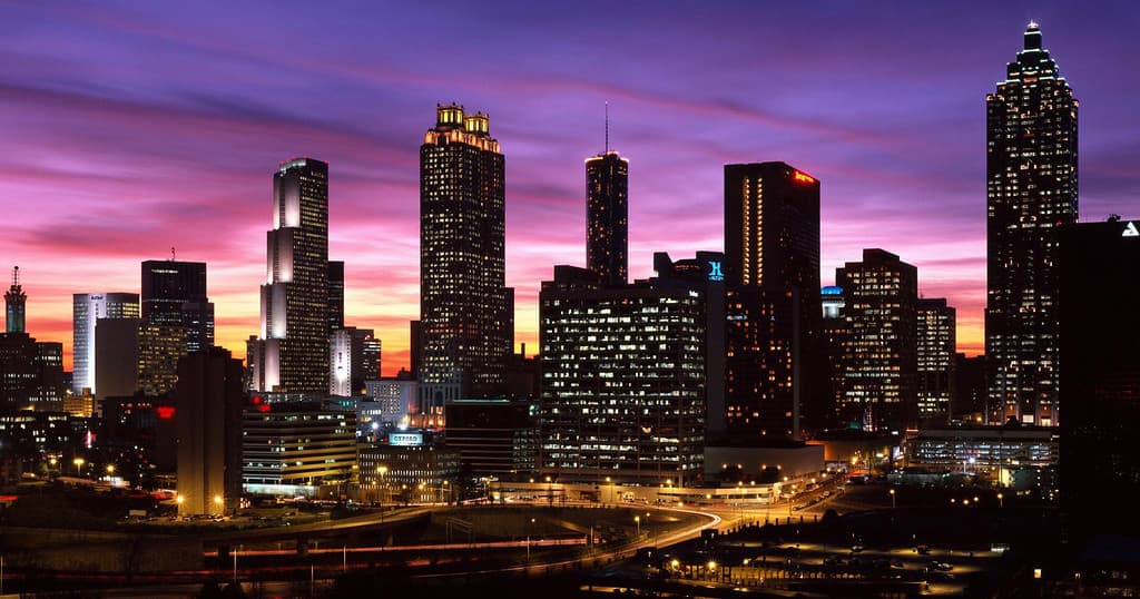 Atlanta downtown skyline at dusk, illuminated buildings for city tours