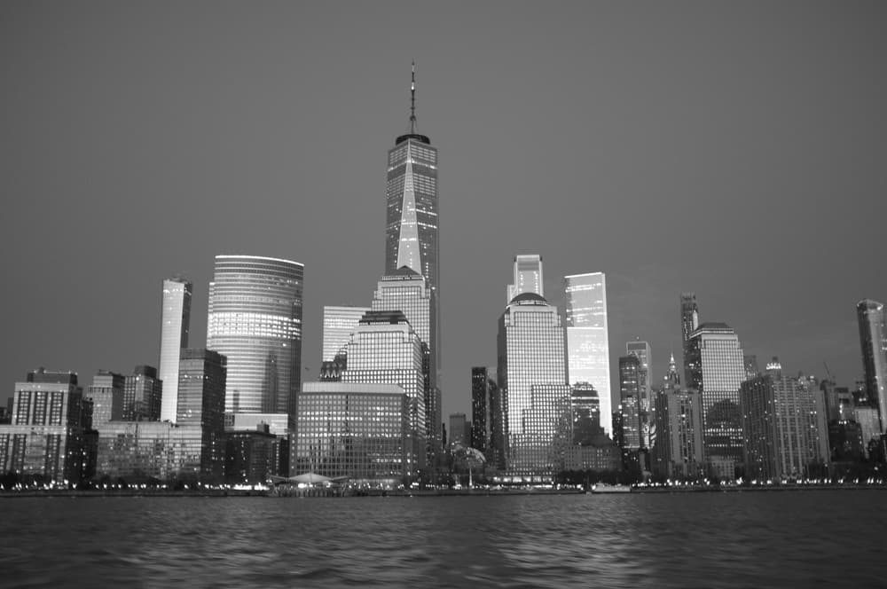 Monochrome skyline of Lower Manhattan seen from harbor boat