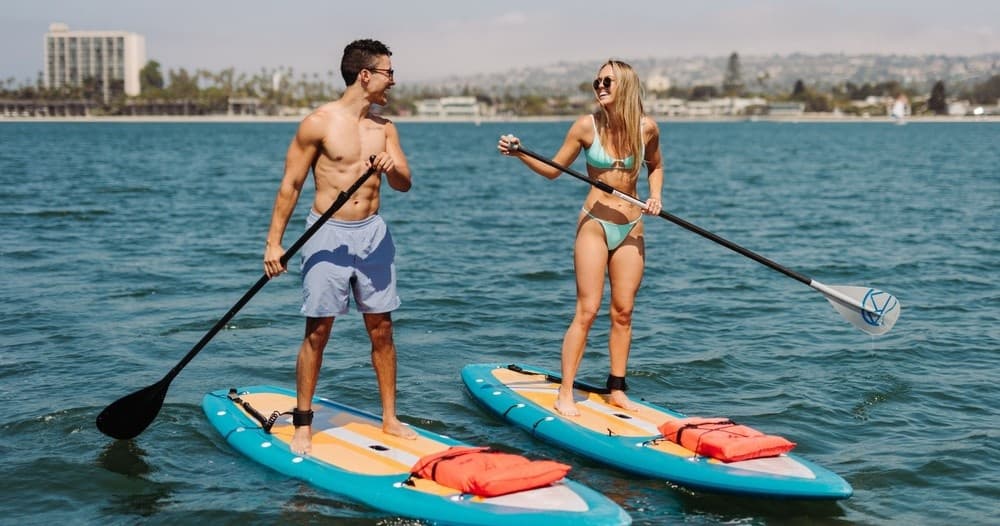 Family enjoying speedboat cruise along a scenic seaside bay