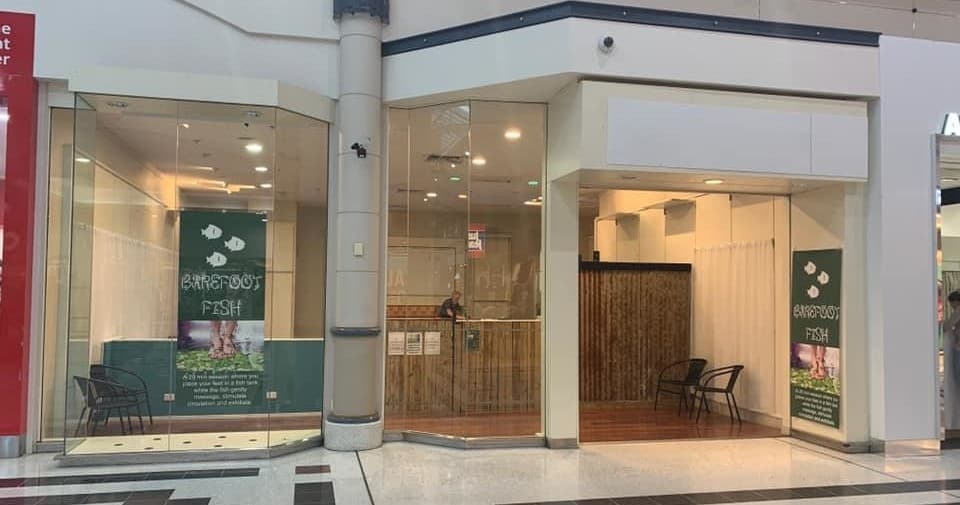Barefoot Fish storefront in mall showing entrance to spa