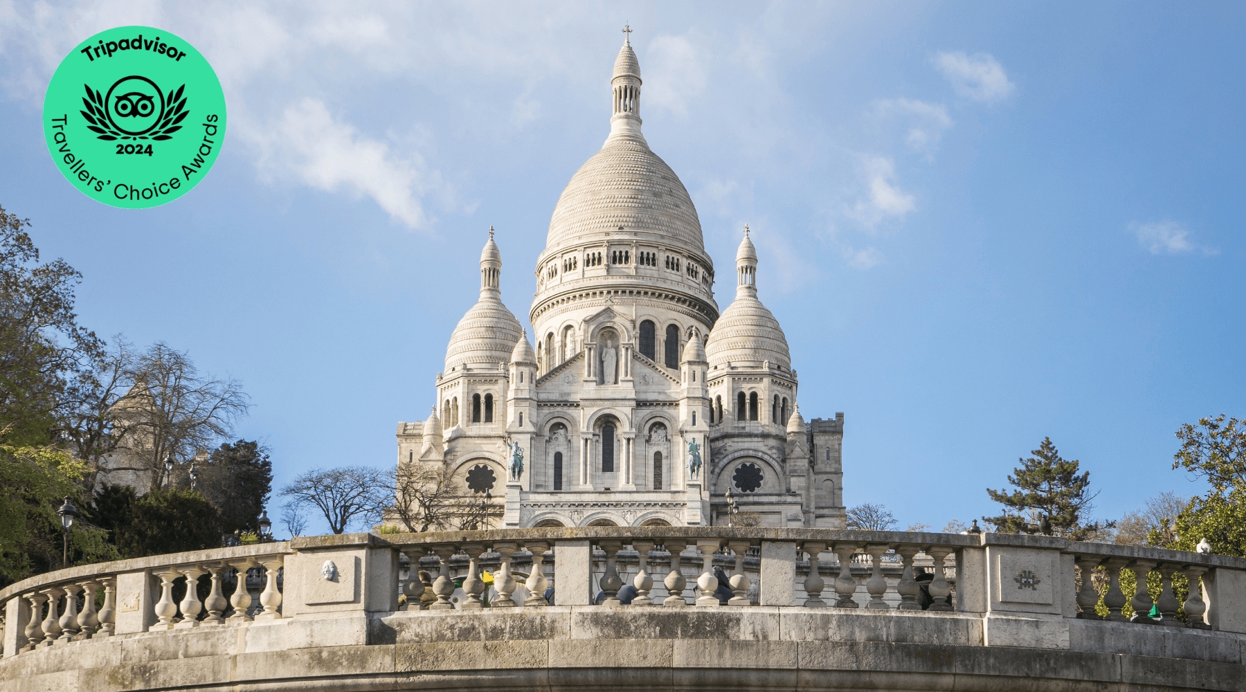 Visitors admiring Sacré-Cœur Basilica on Montmartre hill, Paris