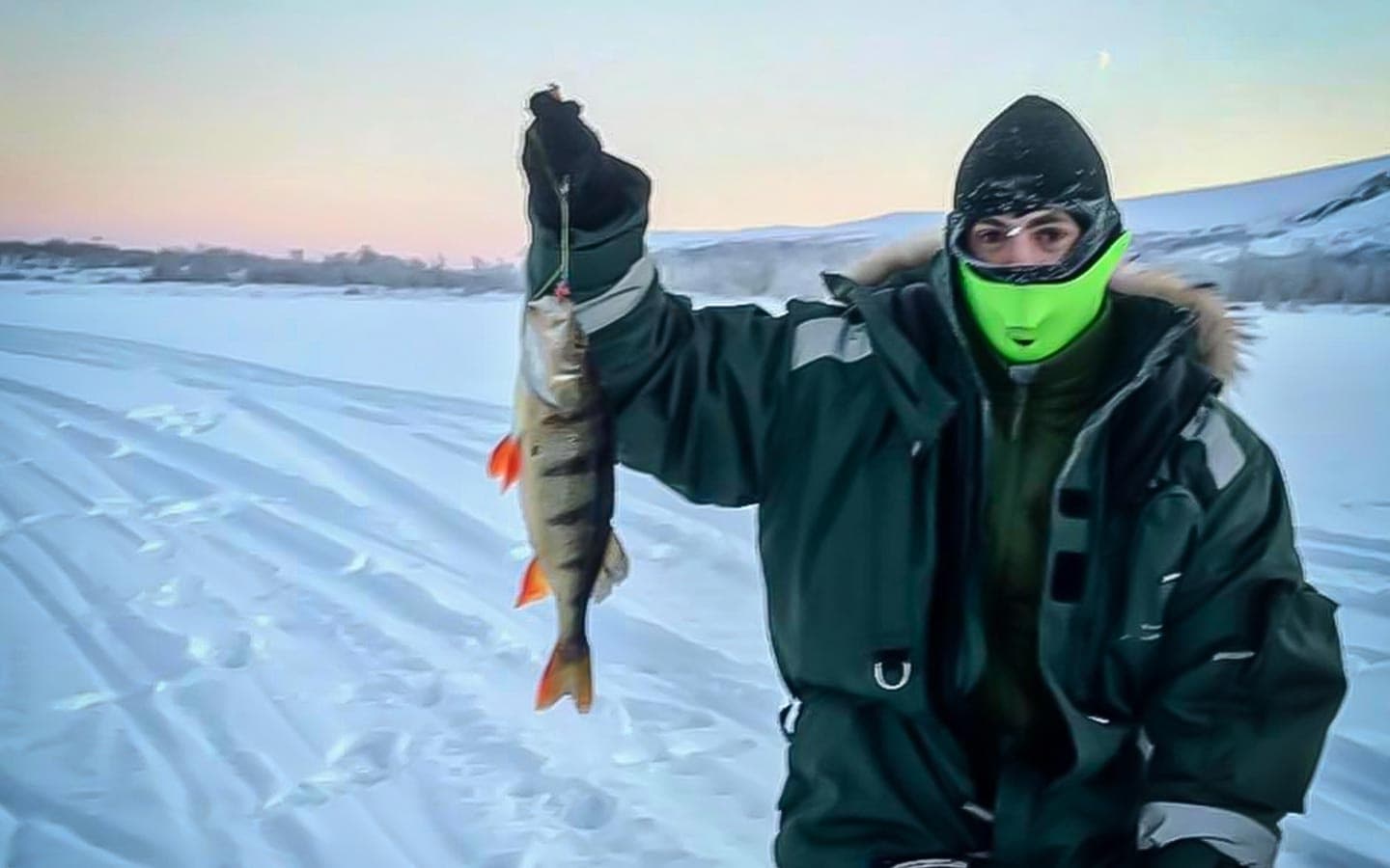 Snowmobile Ice Fishing with Kiruna Guidetur in Lappland