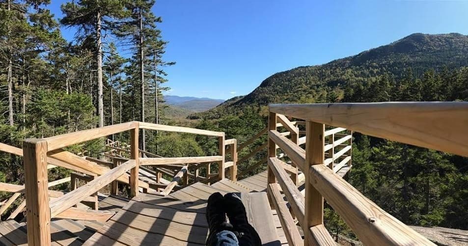 Scenic mountain overlook on wooden deck at Lost River