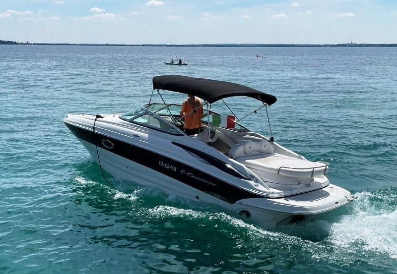 Center-console cruiser boating on turquoise coastal waters