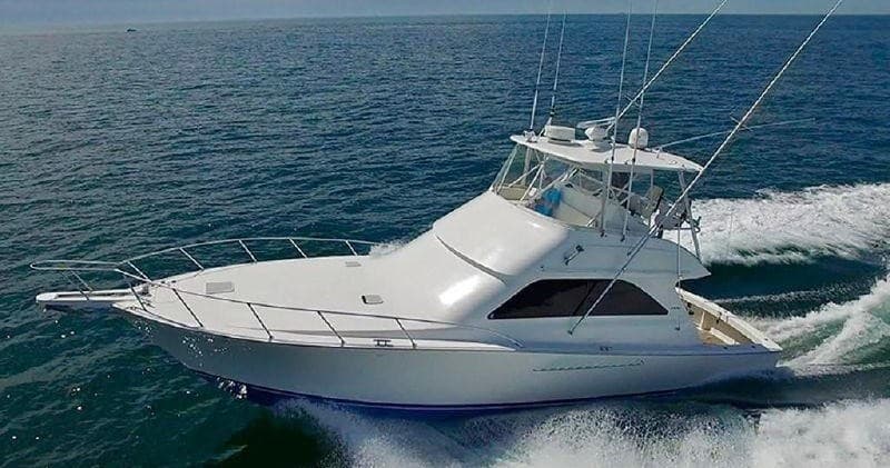 Sportfishing yacht cruising offshore waters for deep-sea charter