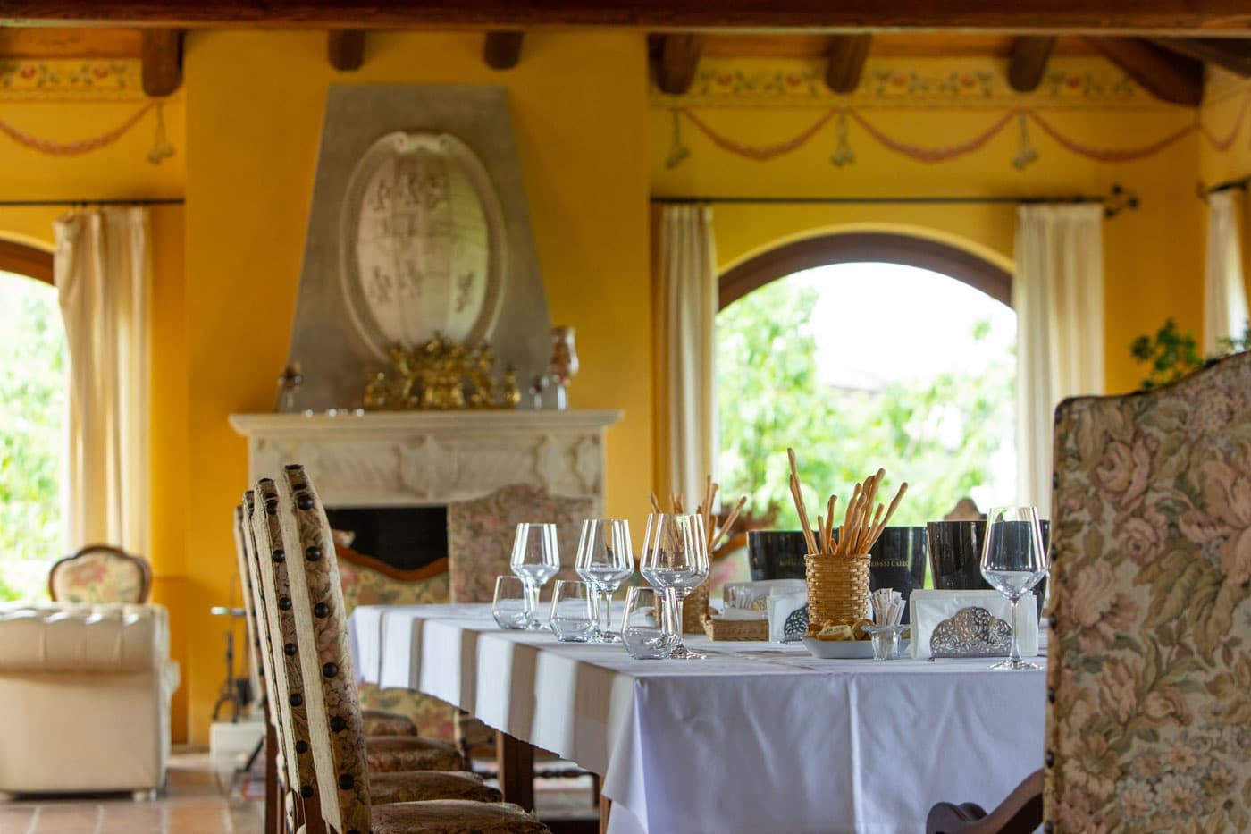 Indoor villa dining room set for gourmet meal and wine tasting