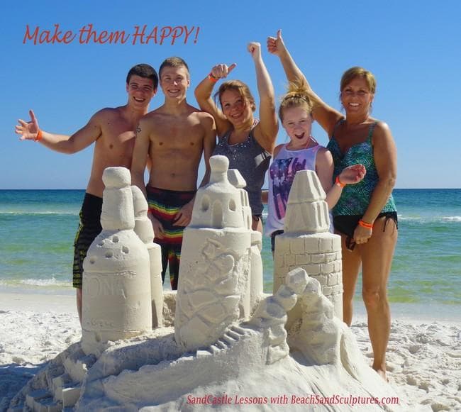 Happy family building elaborate sand towers on Gulf beach
