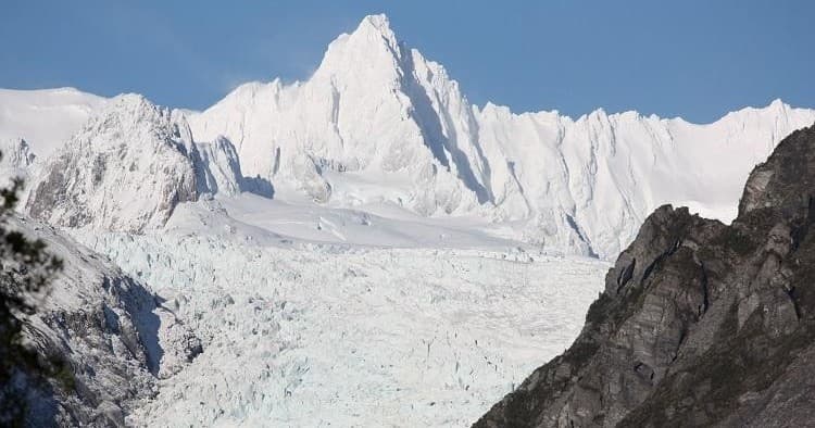 Expansive glacier and jagged peaks, dramatic icefield panorama