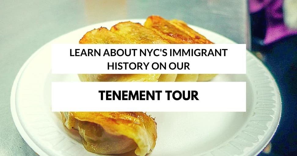 Tenement tour food tasting with empanada on paper plate, NYC