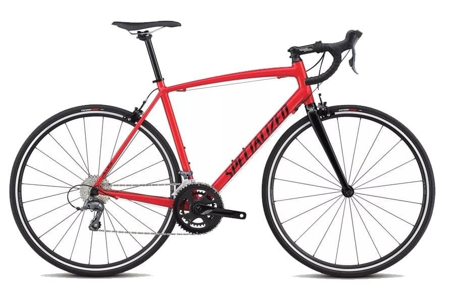 Red road racing bike studio image on white background for bike tours