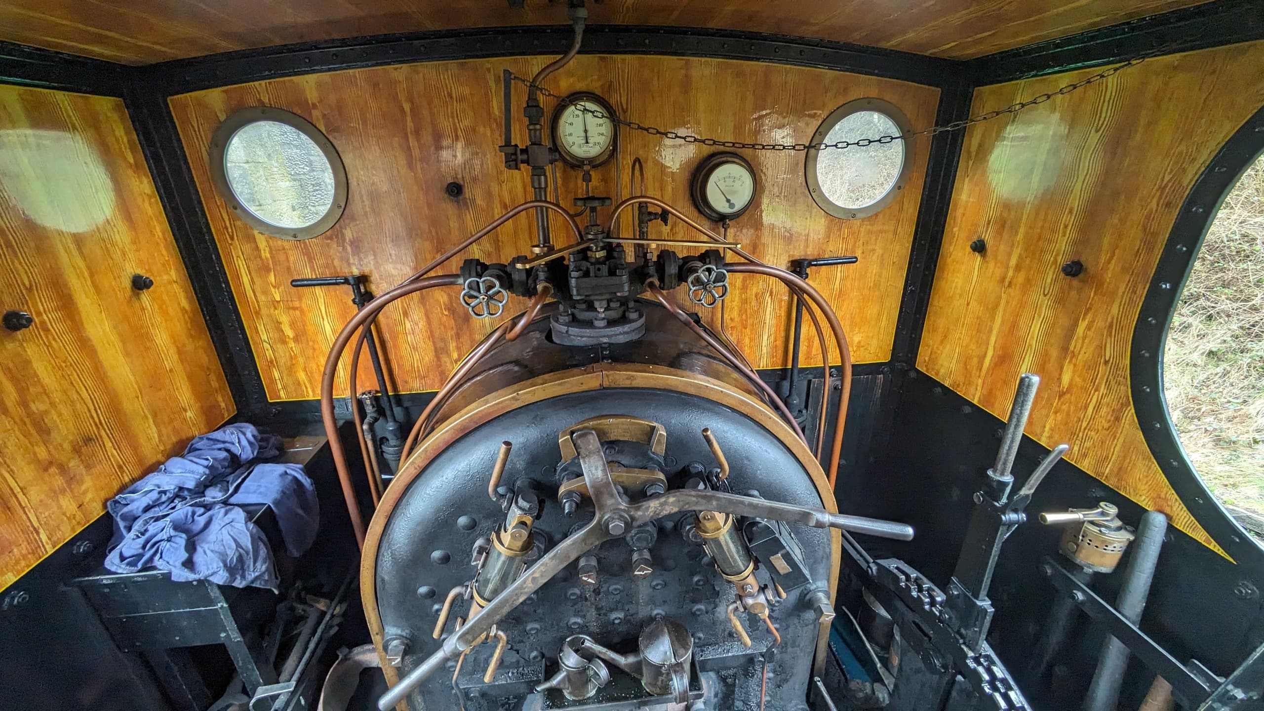 Heritage steam locomotive cab interior showing controls and gauges