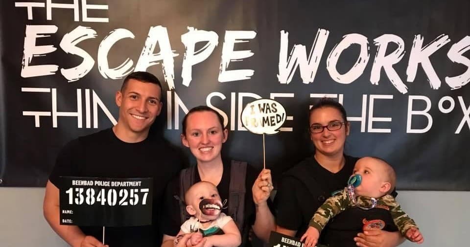 Family team celebrating escape room win at The Escape Works