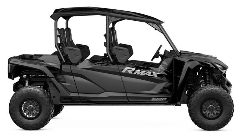 Black Yamaha RMAX four-seat UTV side profile isolated on white
