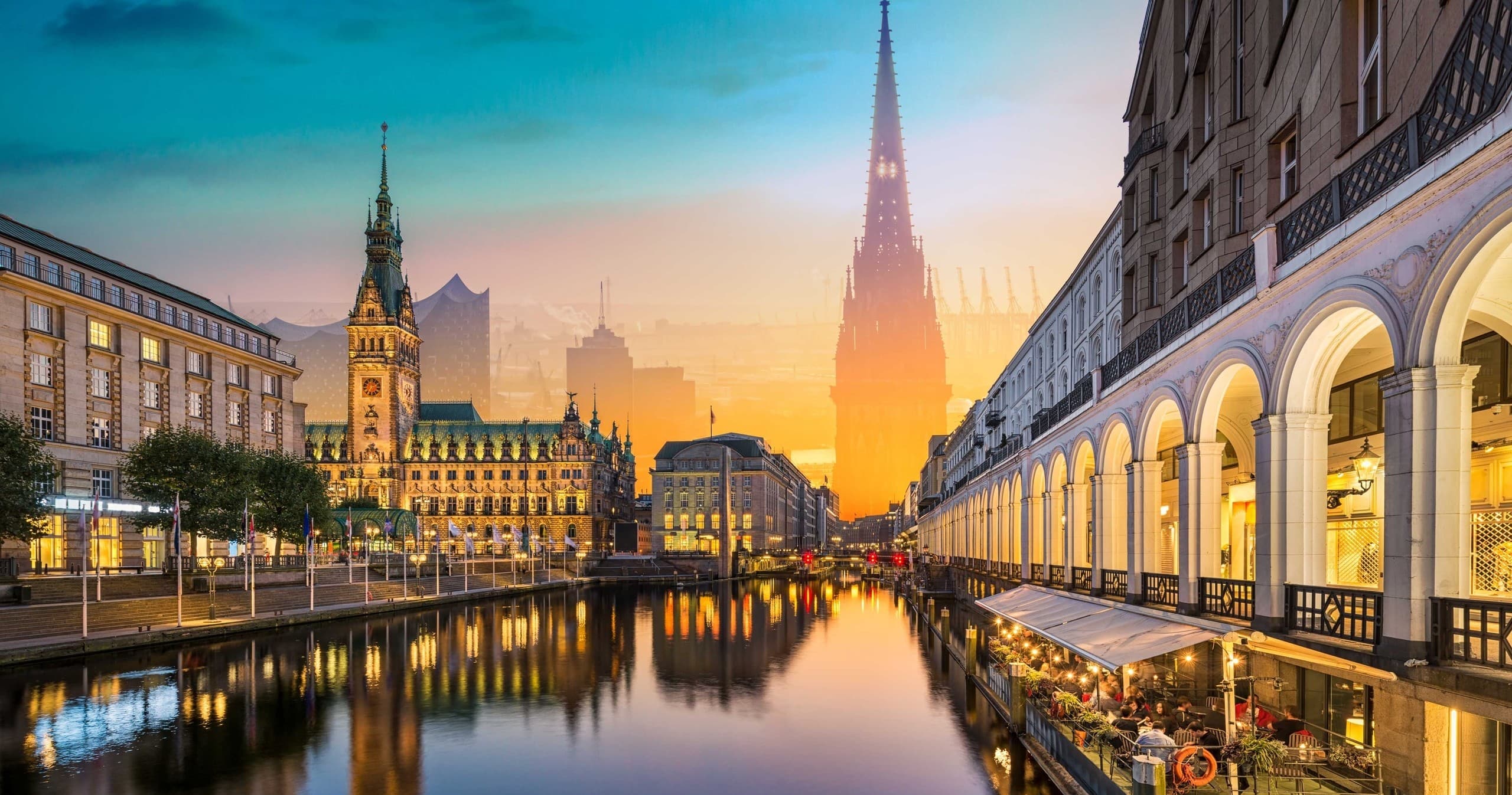 Sunset canal promenade and waterfront skyline in Hamburg