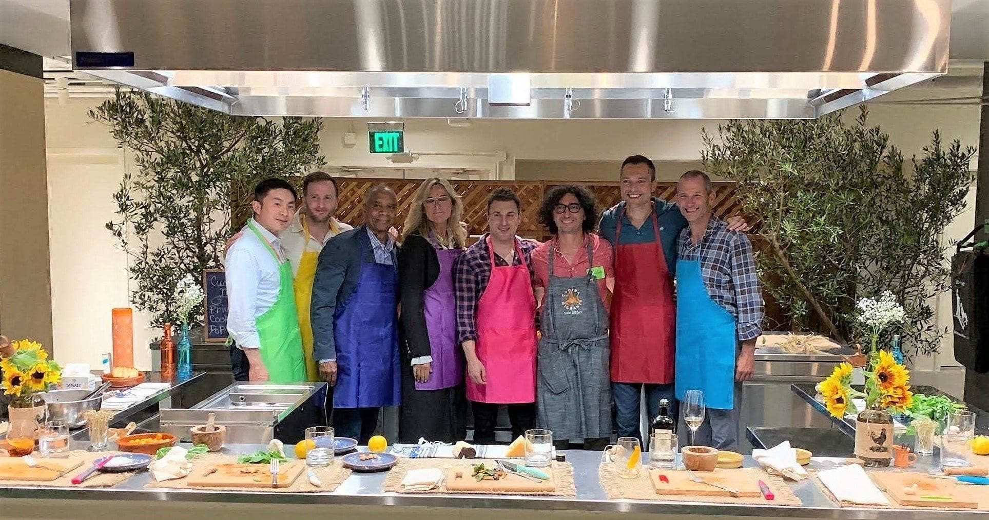Group cooking class in professional kitchen, culinary workshop