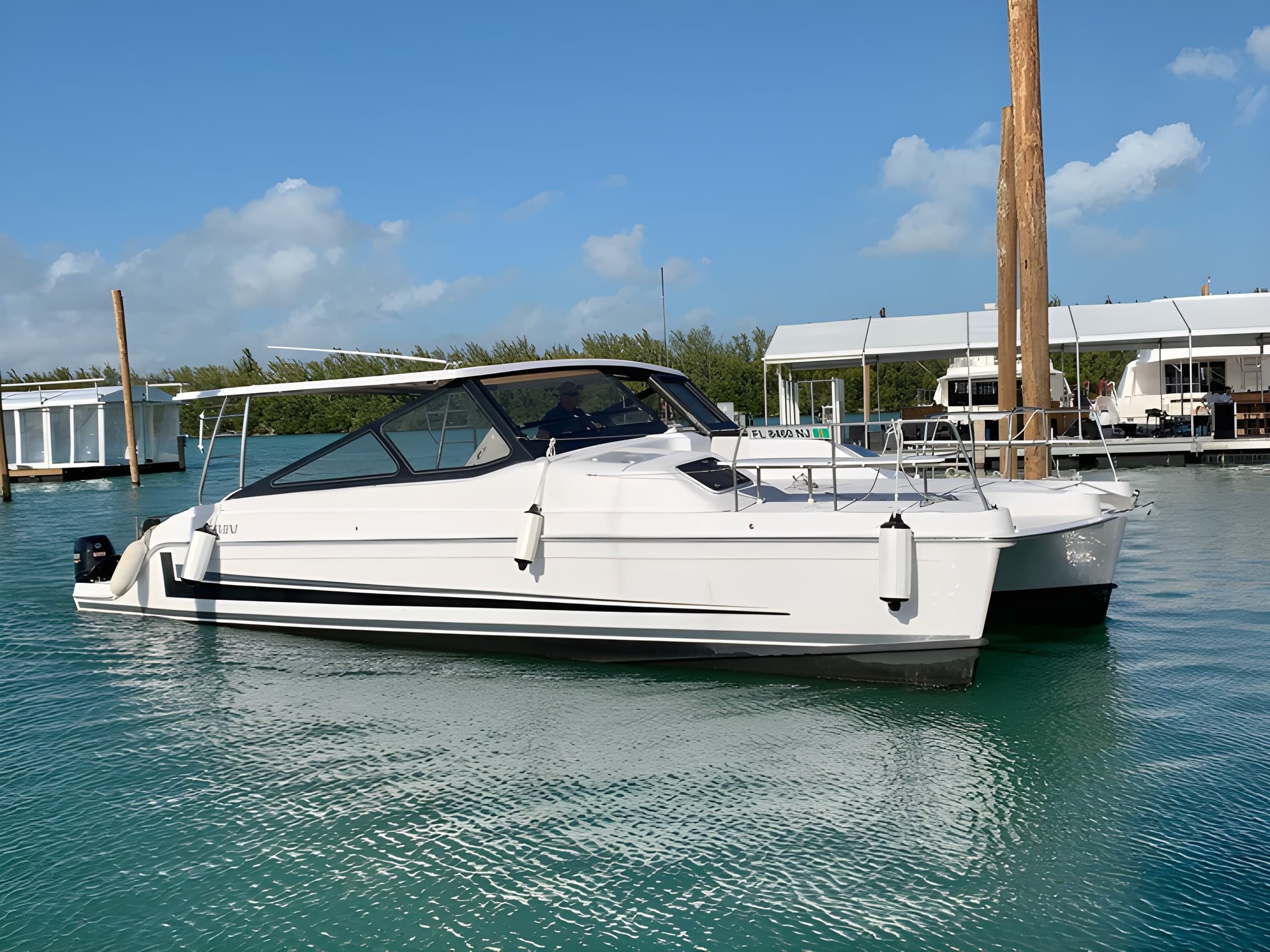 Catamaran Charter Gemini: 4-Hour Crab Island & Emerald Coast Cruise