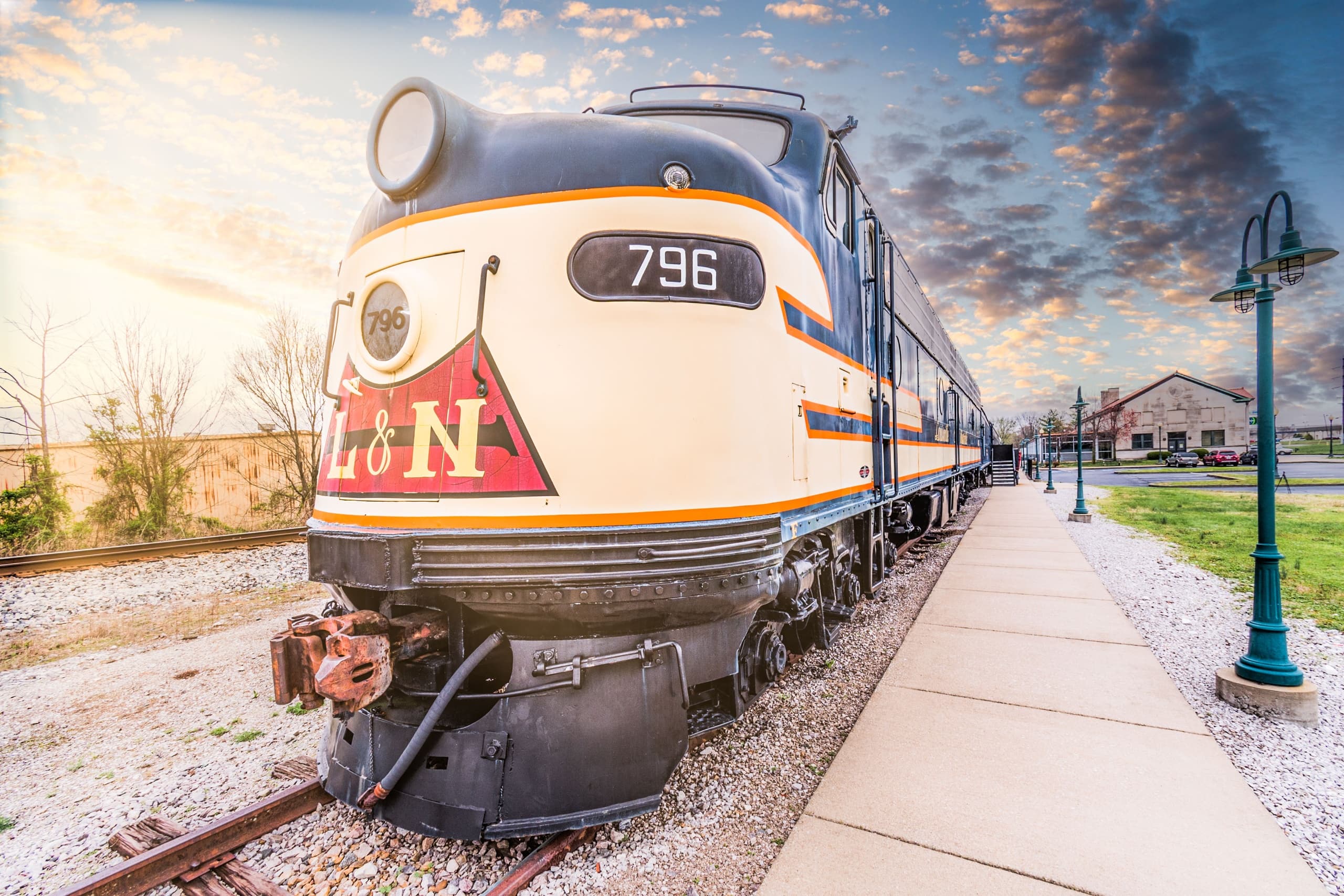 Vintage locomotive at RailPark on outdoor tracks at sunset