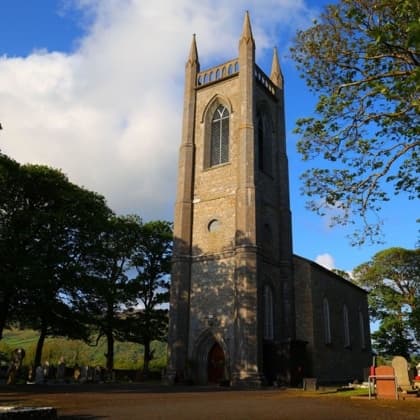 Close-up of Church tower at Drumcliffe under blue sky