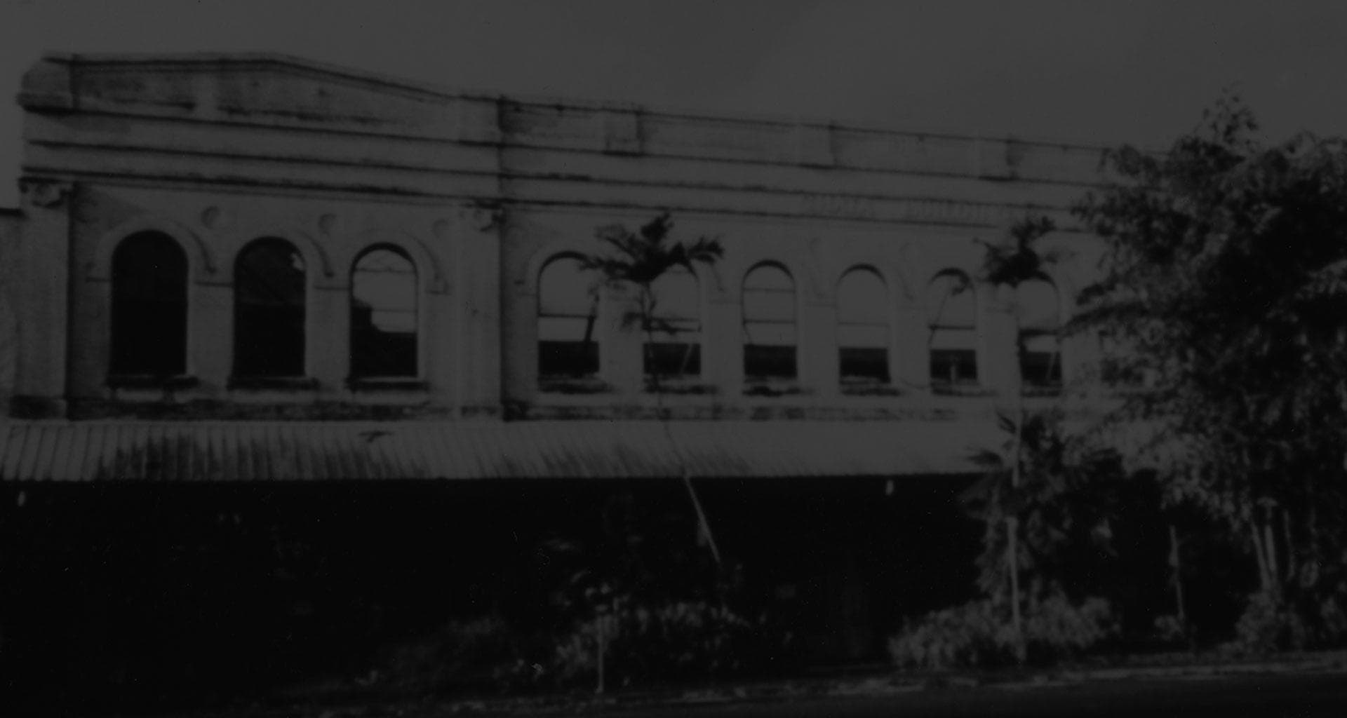 Historic arched facade in monochrome, vintage urban streetscape