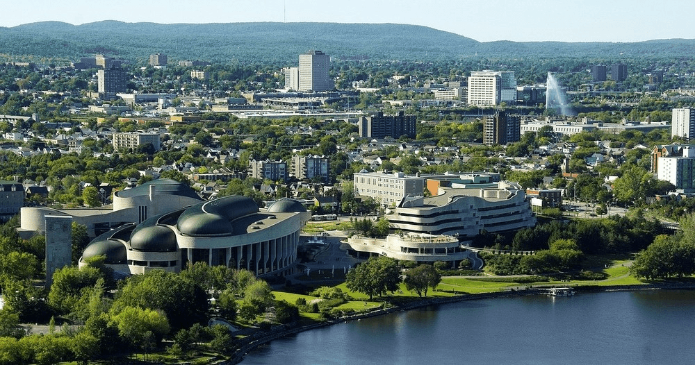Aerial view of Ottawa cityscape and river valley panorama