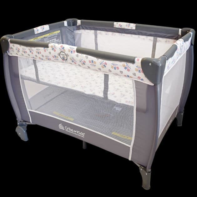 Portable playpen in bright nursery for infant playtime