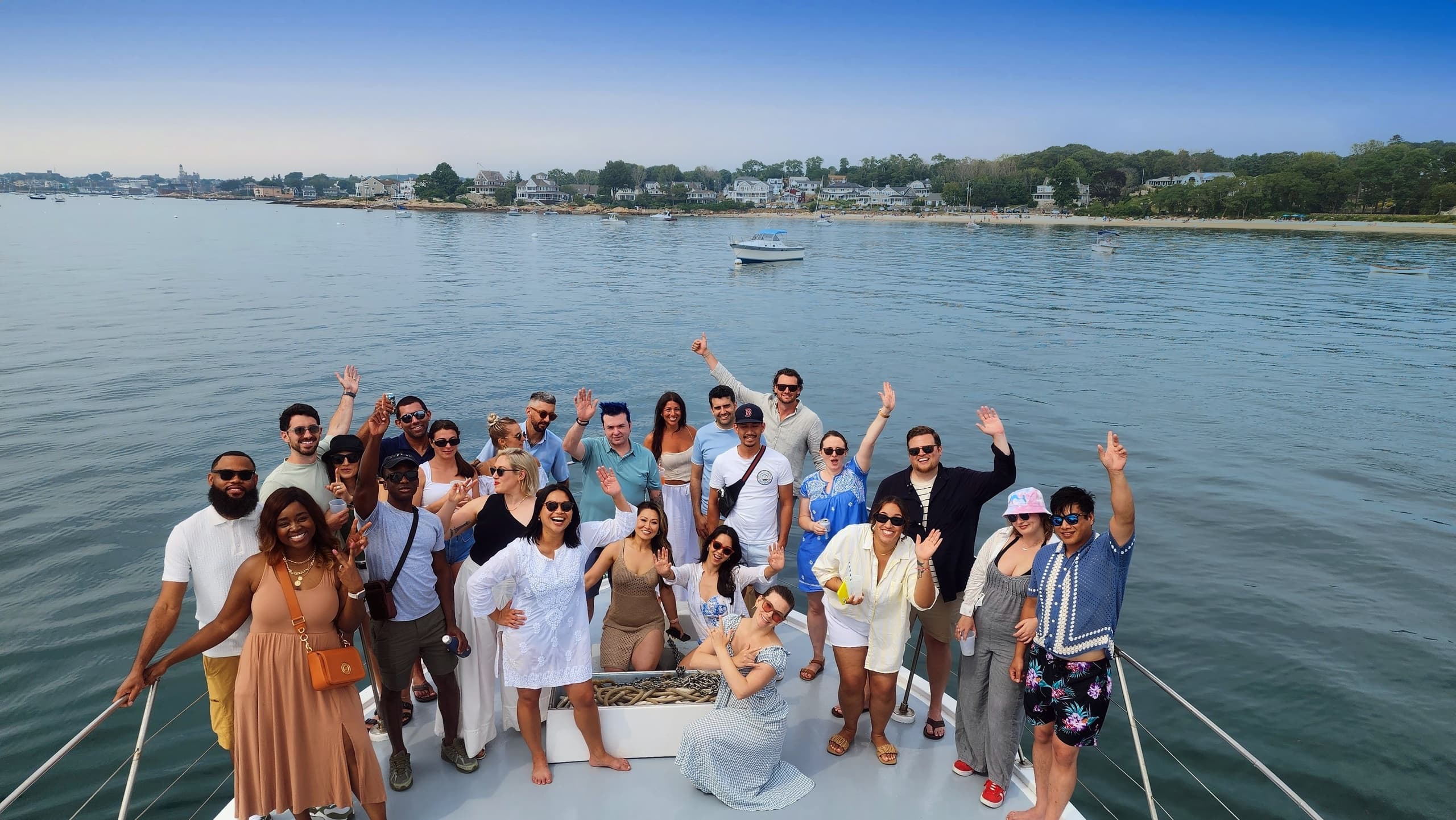 Group cruise on Cape Ann boat deck, passengers enjoying harbor