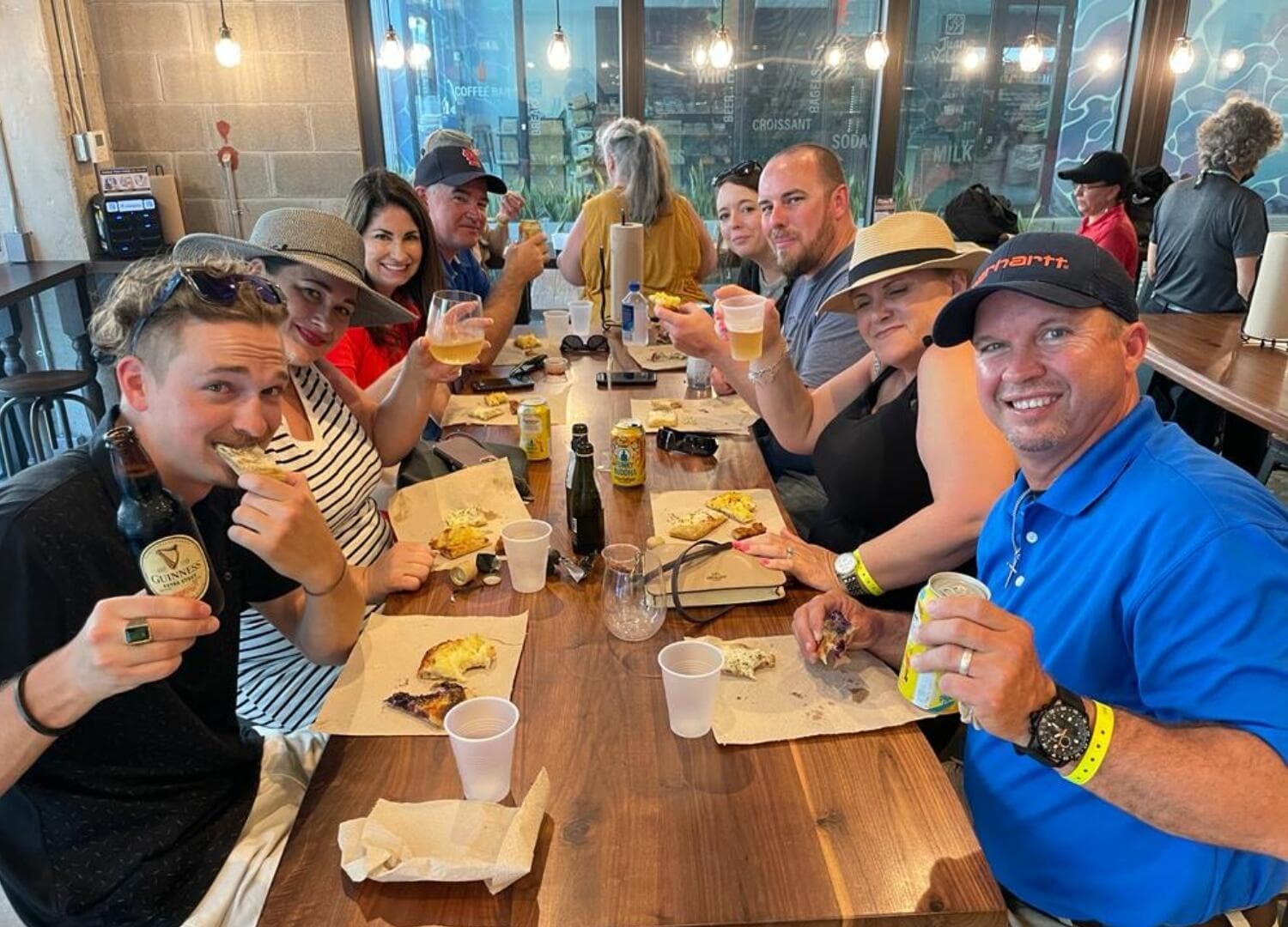 Group enjoying food and drinks on Ybor City tasting walking tour