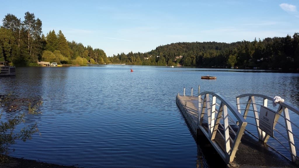 Lake dock and calm waters for paddling near Langford shoreline