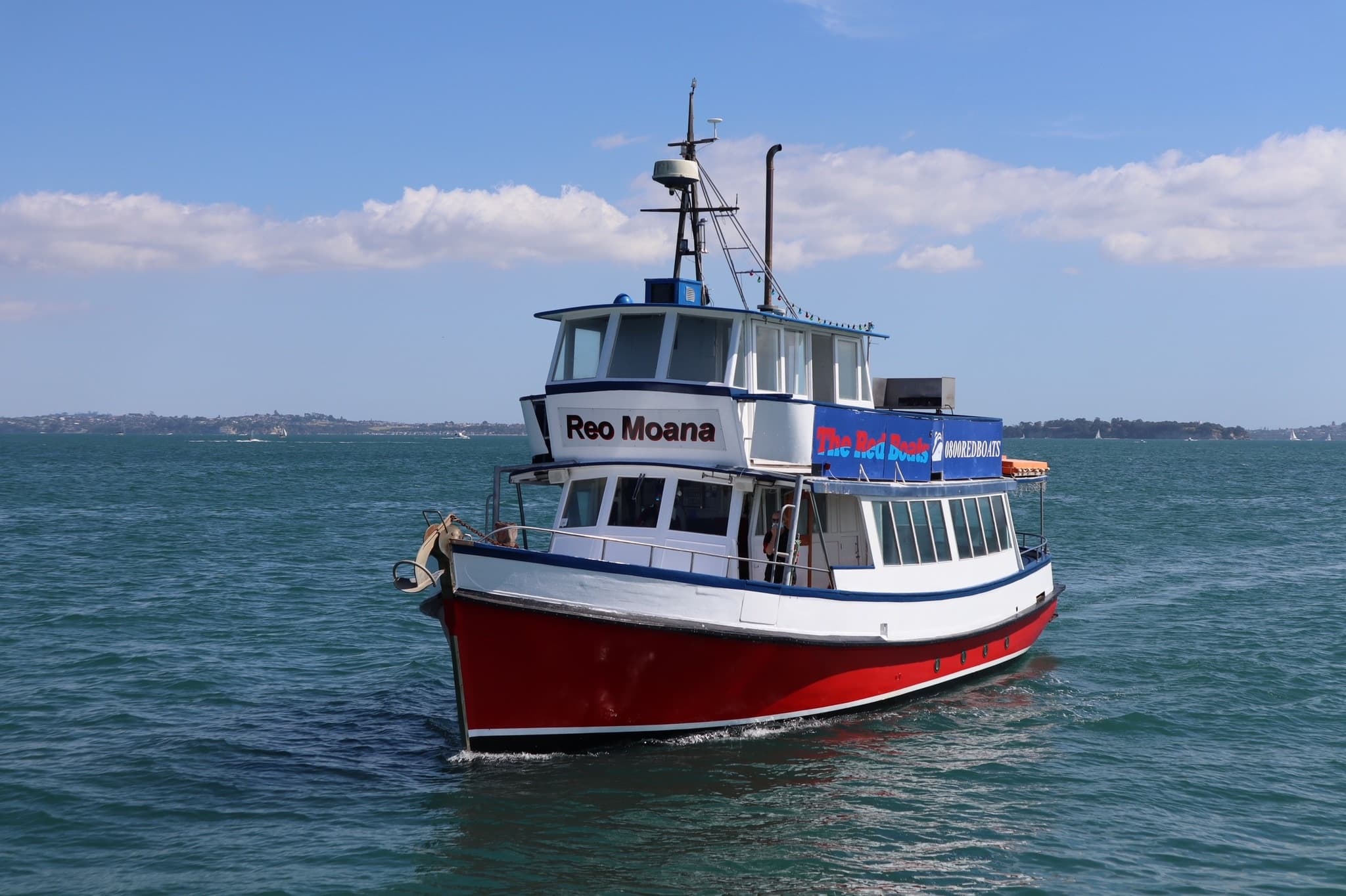 Harbour Hops: The Red Boats' Scenic Cruise to The Riverhead & Portage Bar from Westhaven