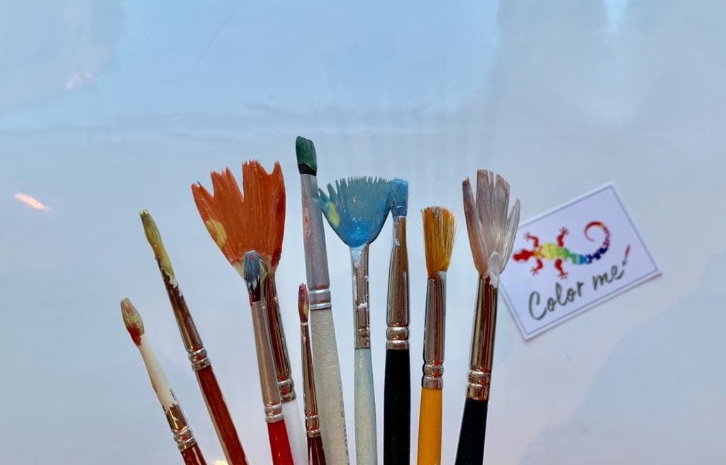 Selection of paintbrushes displayed at ceramics studio