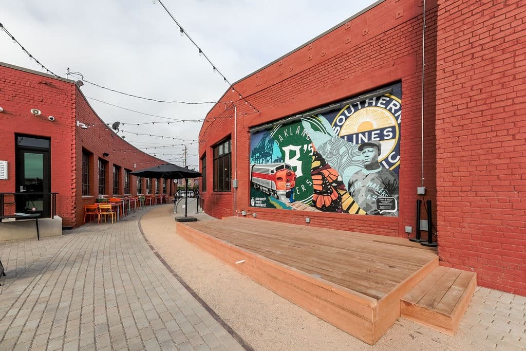 City Patio Escape: Semi-Private Outdoor Lounge at Prescott Market, Oakland