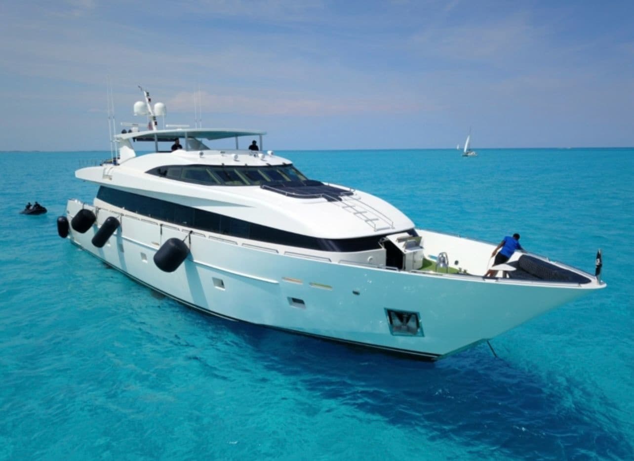 Luxury yacht floating in crystal turquoise waters near Miami