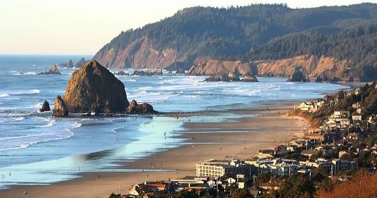 Cannon Beach coastline with Haystack Rock, panoramic seaside vista