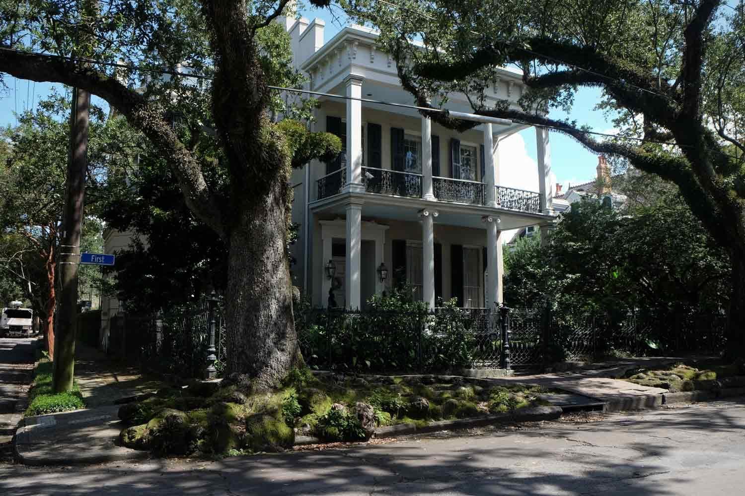 Historic oak-shaded Creole mansion porch tour in New Orleans