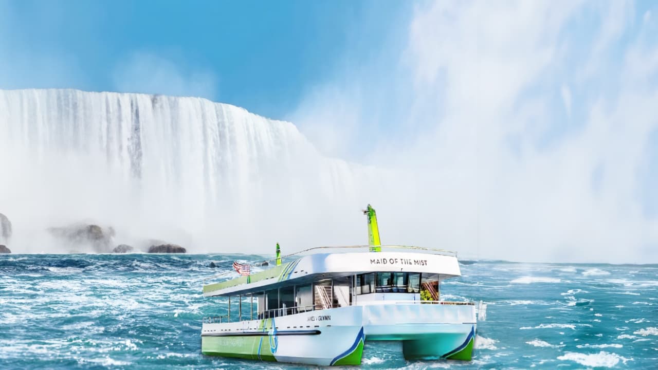 Small sightseeing boat navigating churning waters at Niagara Falls