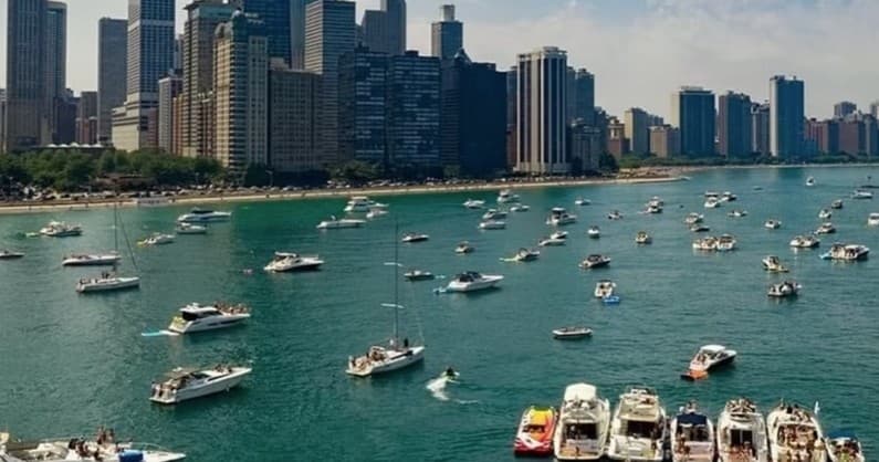 Numerous pleasure boats anchored on Lake Michigan near Chicago shore