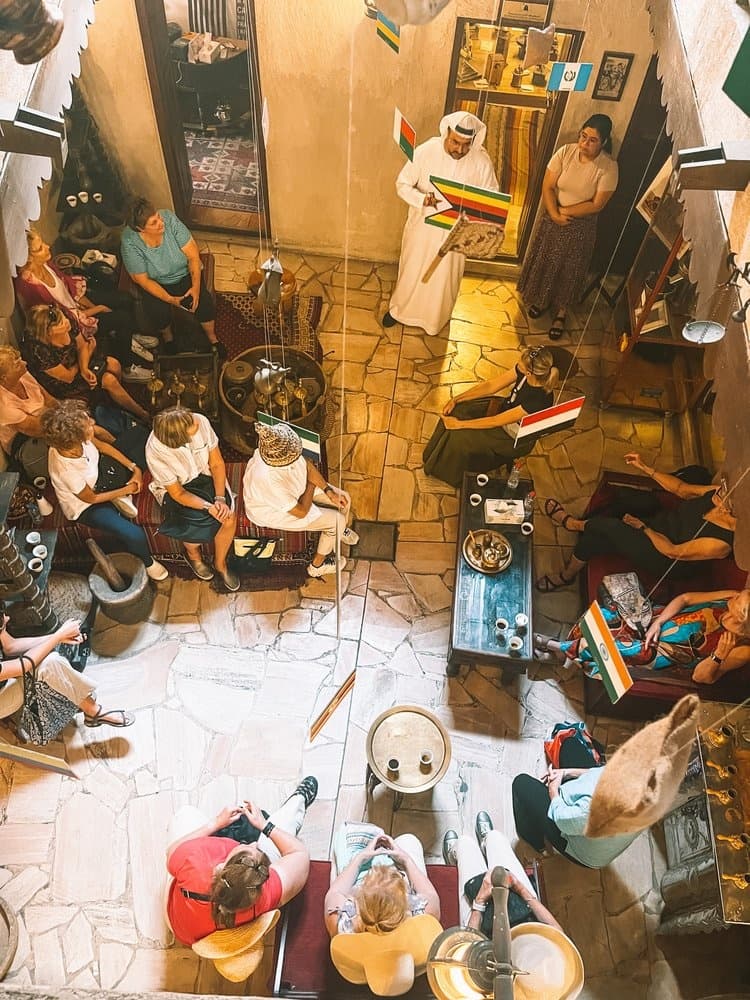 Traditional coffeehouse gathering in old town, cultural tour
