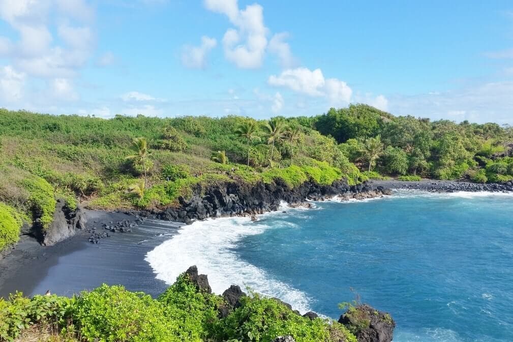 Scenic black sand coastline and ocean cliffs on Maui