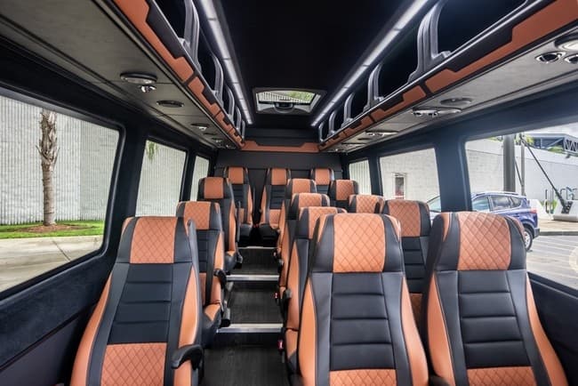 Luxury passenger van interior with leather seats for group transfers