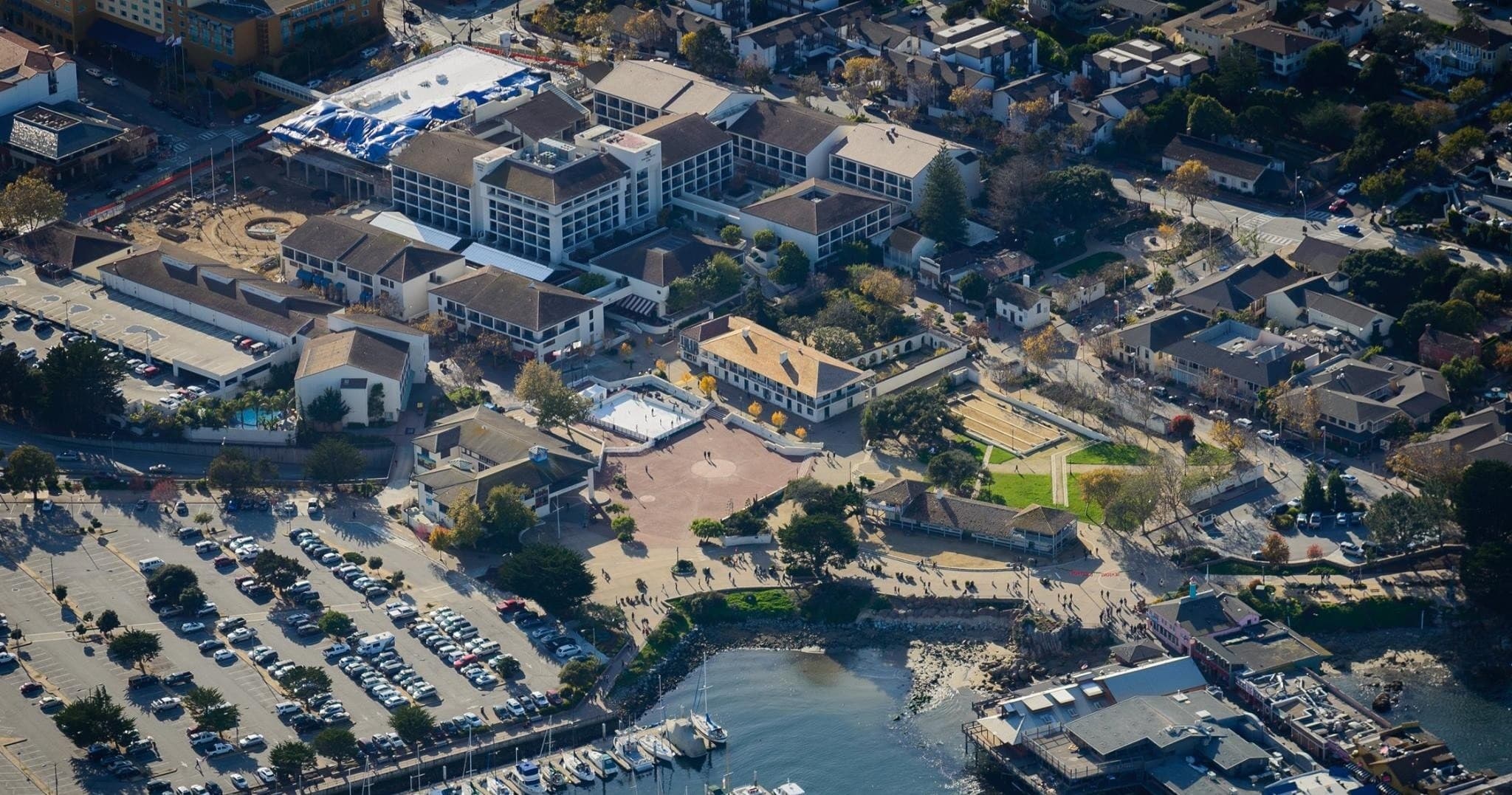 Aerial waterfront view of harbor and seaside town