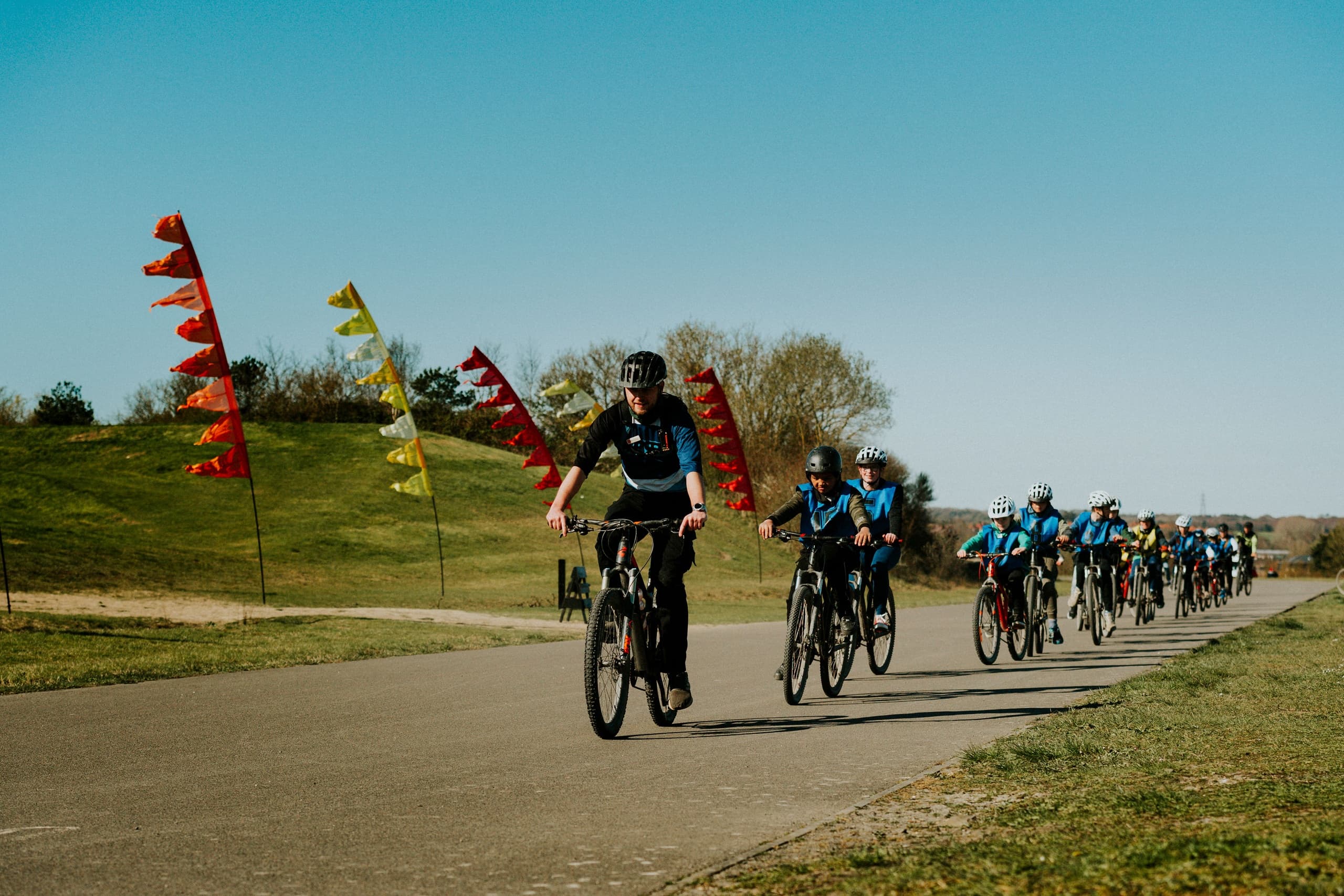 Cyclists racing on scenic coastal park road at Betteshanger