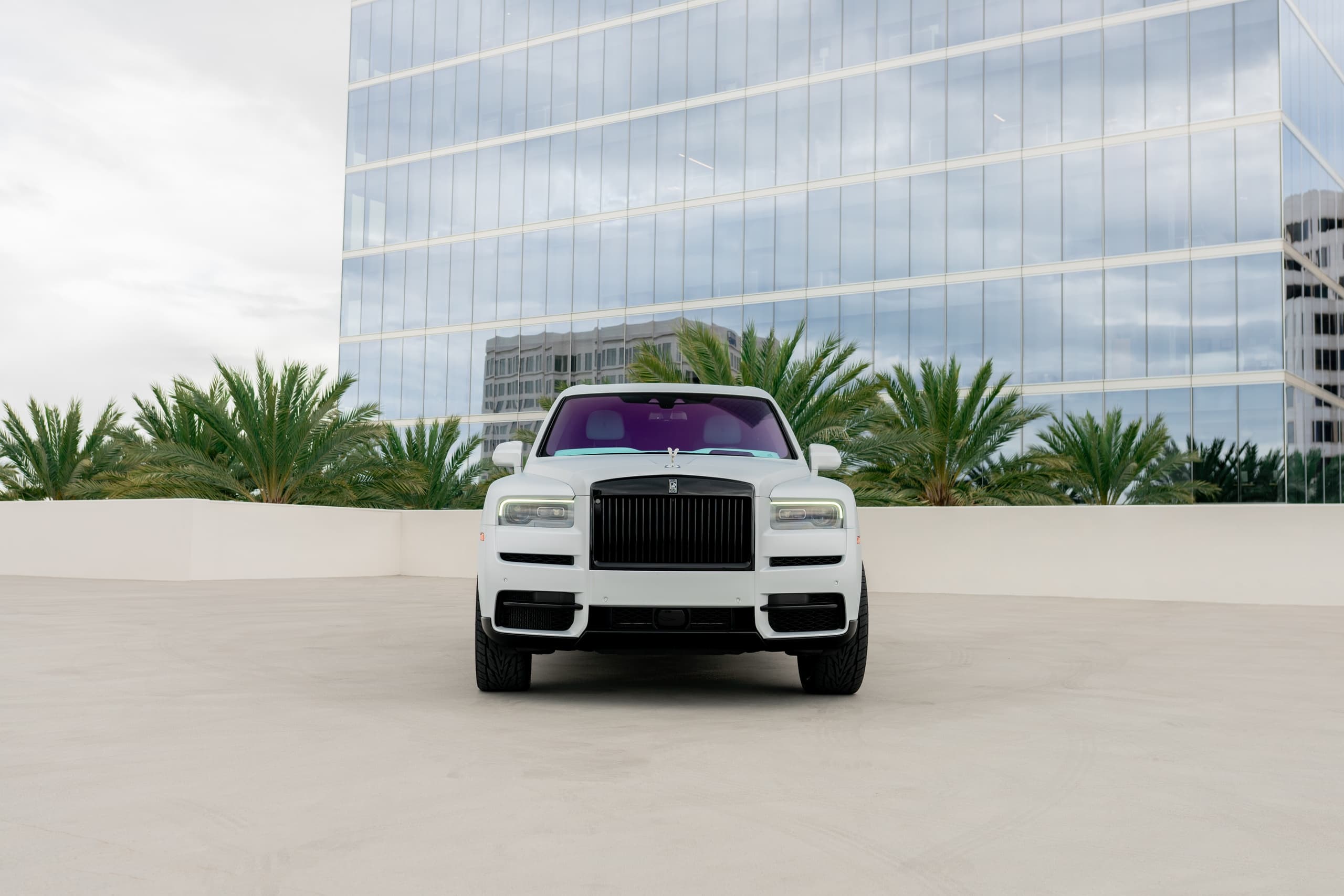 Coastline Cruise: White Rolls Royce Cullinan Rentals in Huntington Beach photo 3