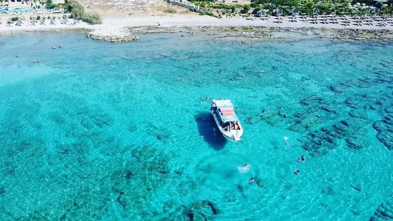 Glass-Bottom Boat Melani: 90-Minute Lindos Cruise to Navarone Cliffs and St. Paul’s Bay photo 1