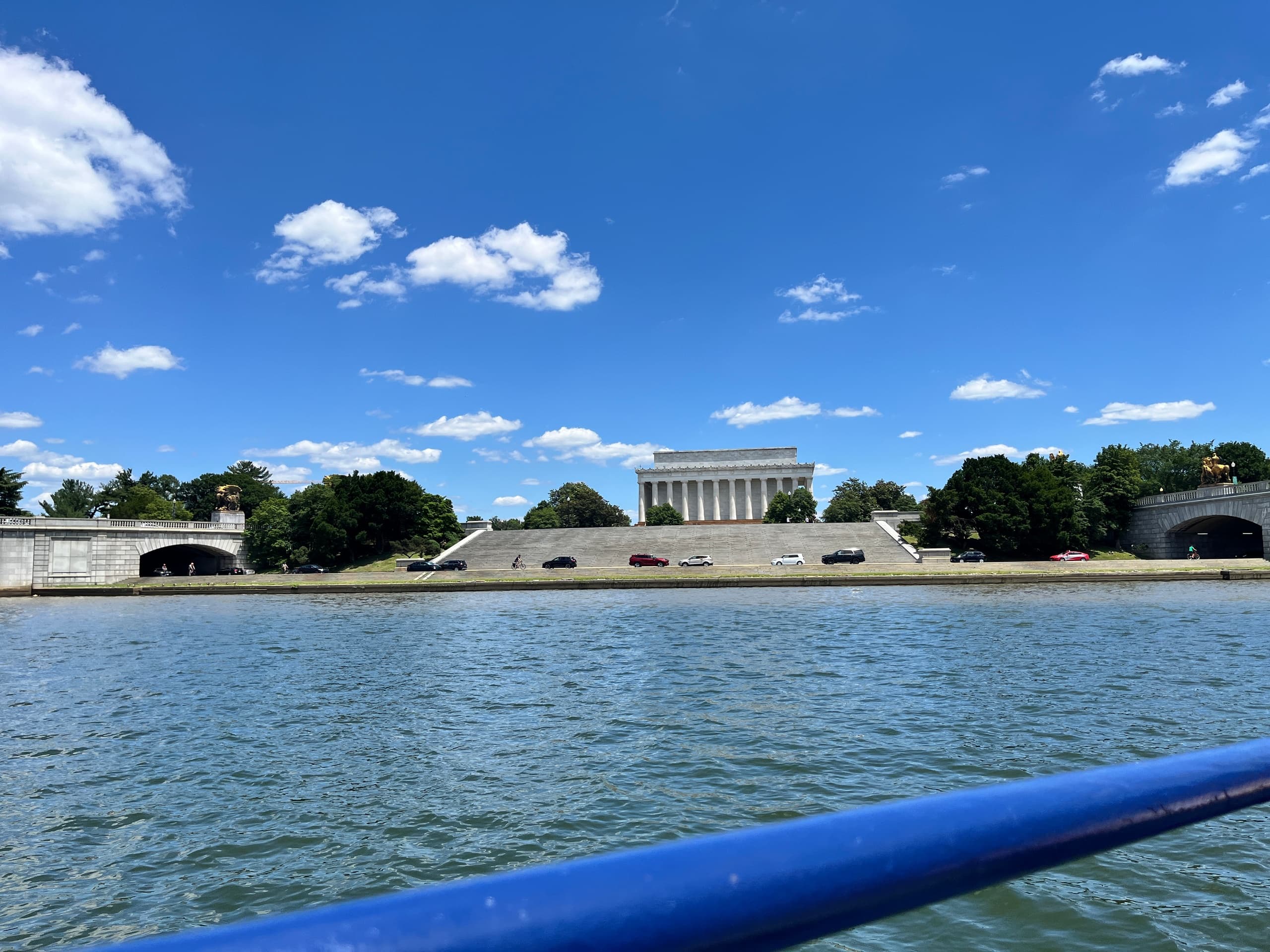 Wide riverfront view of the National Mall and monuments from Potomac waterfront