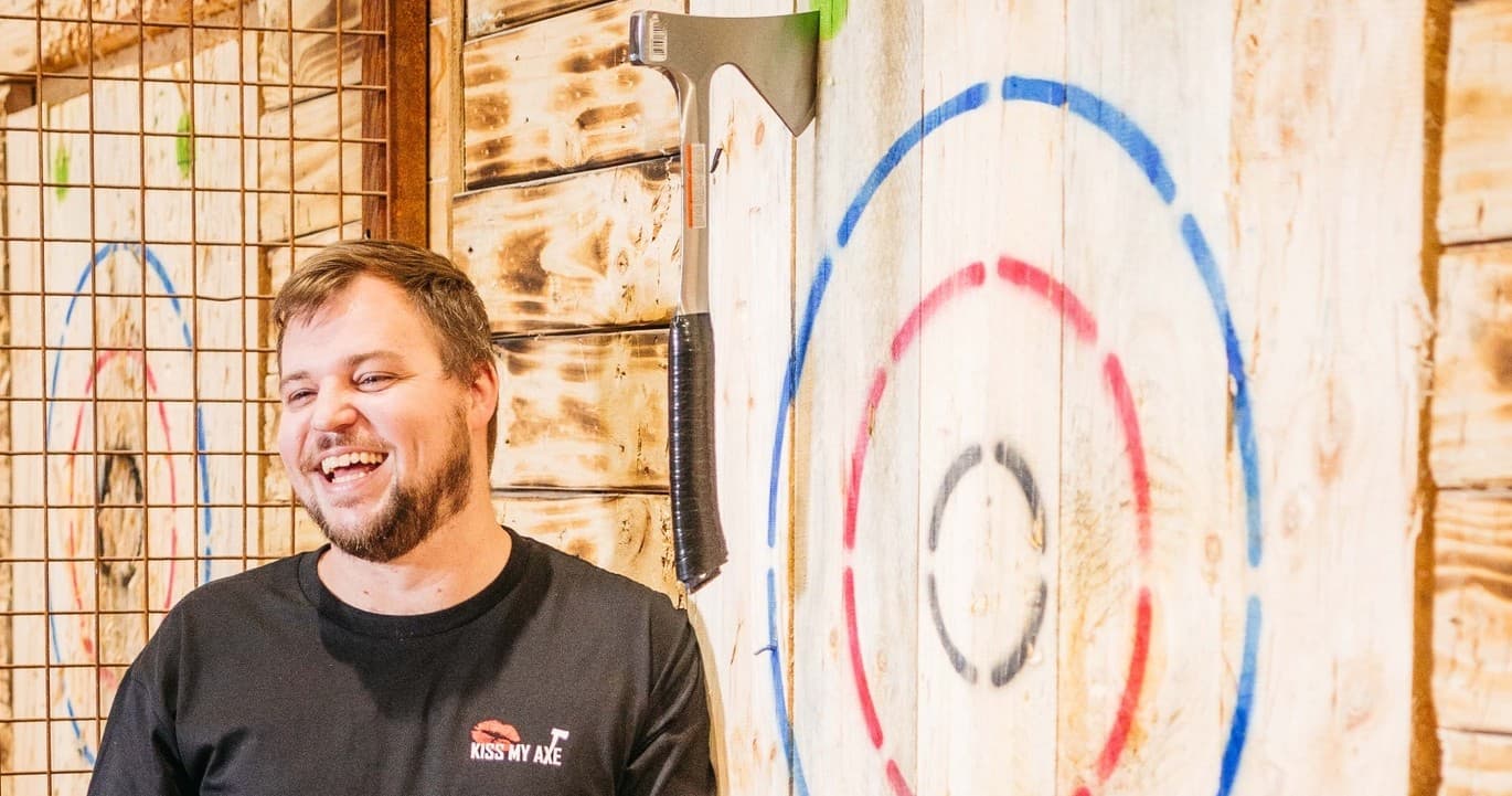 Alexandria Axe-Throwing Party Package: Pizza, Drinks & Glow Darts