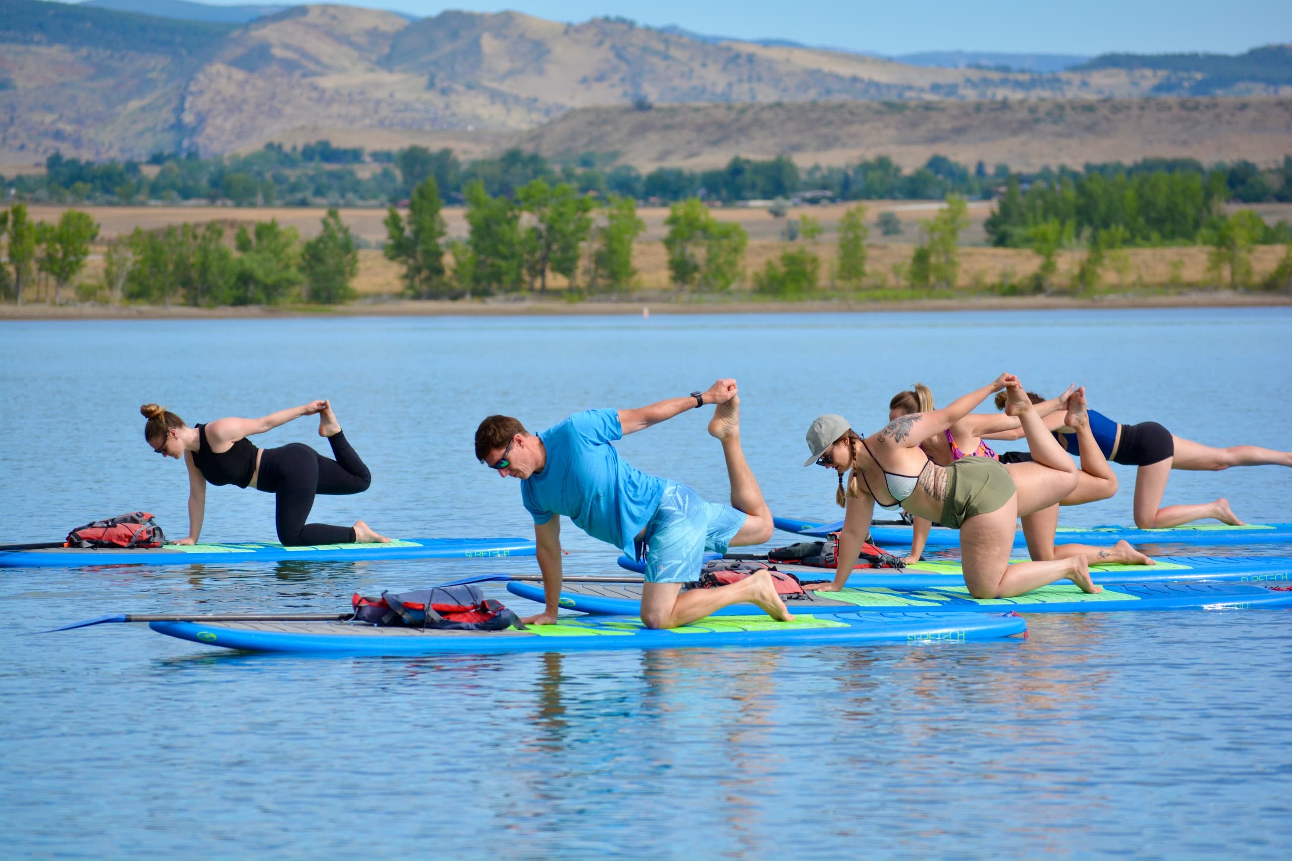 SUP Yoga in Longmont, Colorado: Find Your Balance on Water